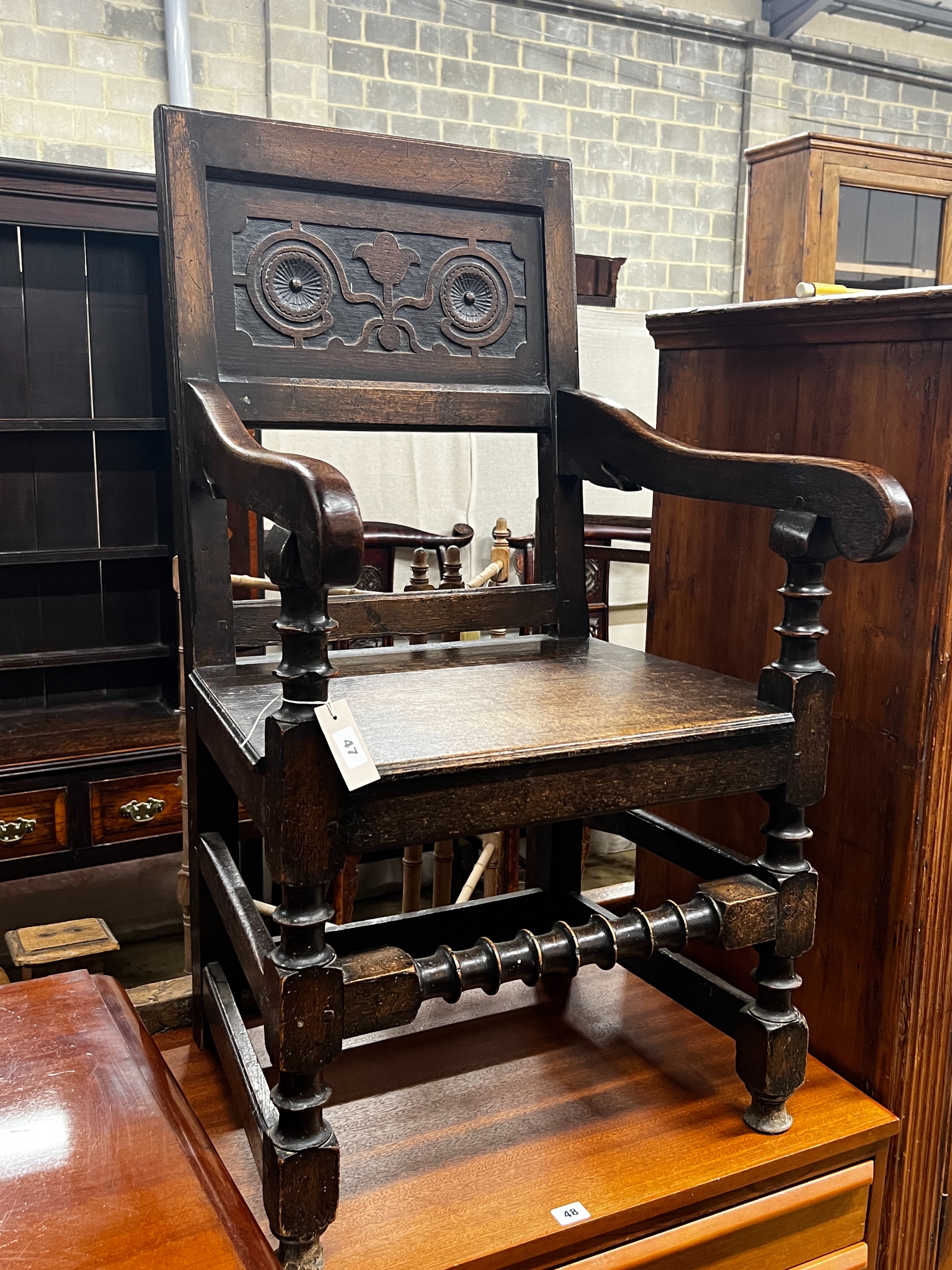 A Victorian Jacobean Revival oak Wainscot chair, width 55cm, depth 43cm, height 102cm